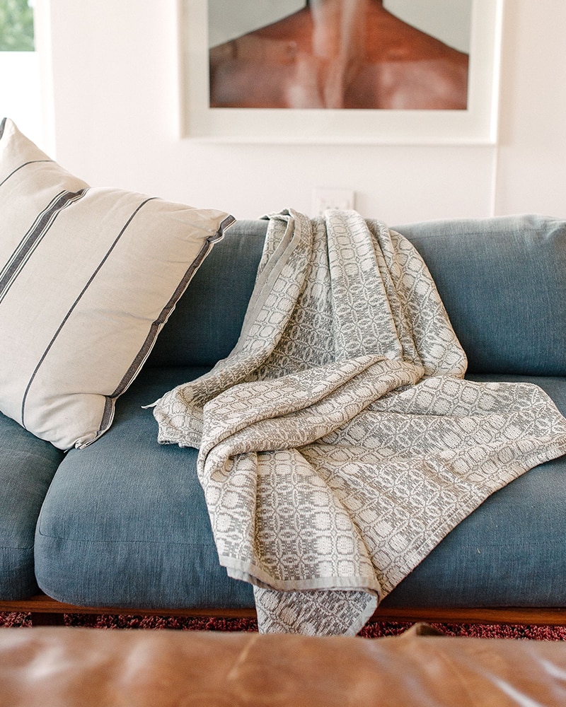Mungo Juno Throw in Grey. 100% cotton throw, inspired by traditional 18th century American coverlets. Woven at the Mungo Mill in South Africa