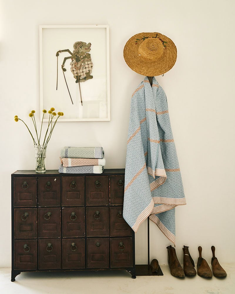 The Mungo Itawuli in Dusty Teal. Cotton towels for beach or bath