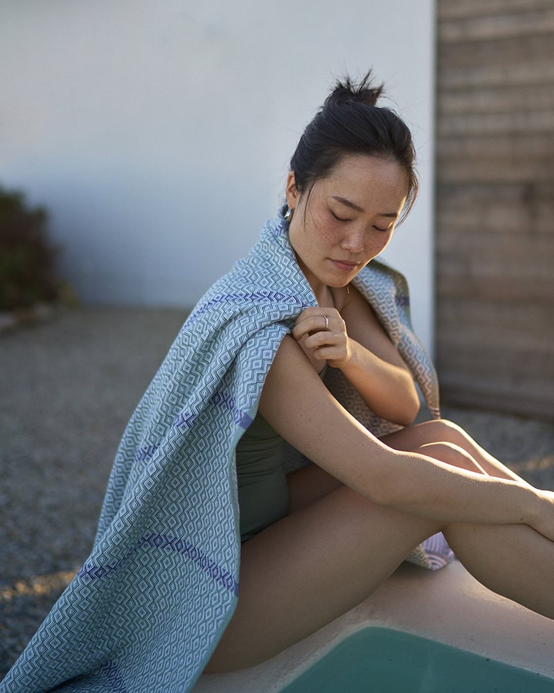 Model wrapped in the Mungo Itawuli in Pine Green