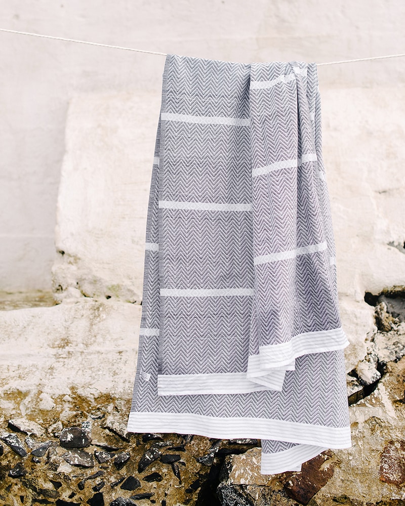 Mungo Tawulo - a pure cotton towel, photographed at Dalebrook Tidal Pool in Cape Town
