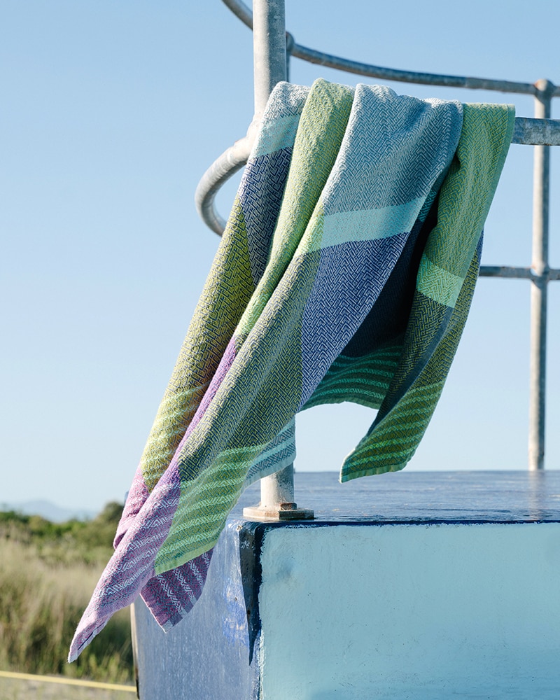 The Mungo Folly Towel in Seaglass colourway. 100% cotton towels for bath or beach