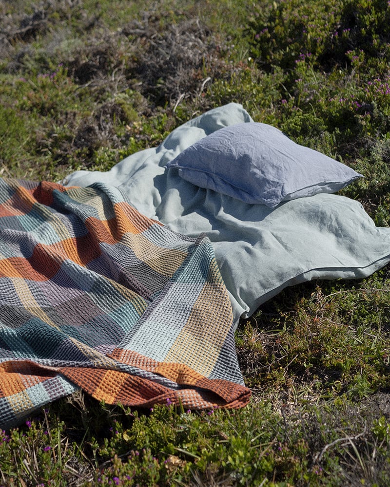 Mungo Vrou Vrou in Cypress. Textural & colorful waffle weave blanket woven at the Mungo Mill in South Africa. 100% cotton