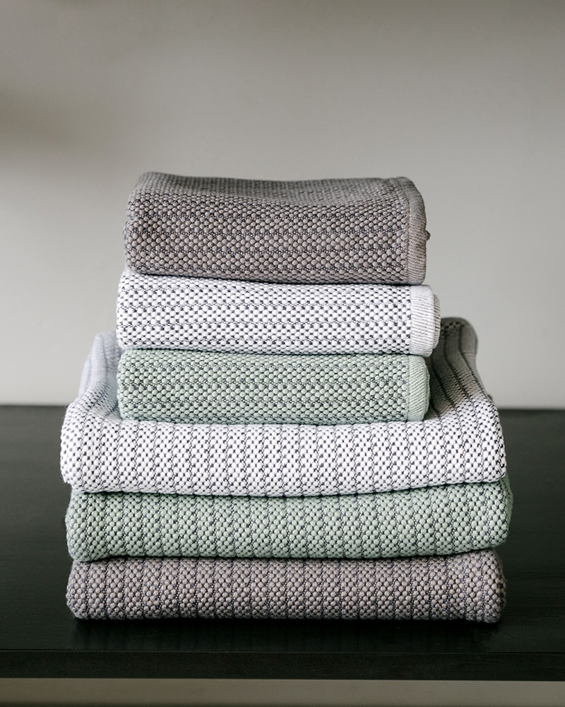 Stack of Mungo Cotton Rib Bath and Shower Mats.