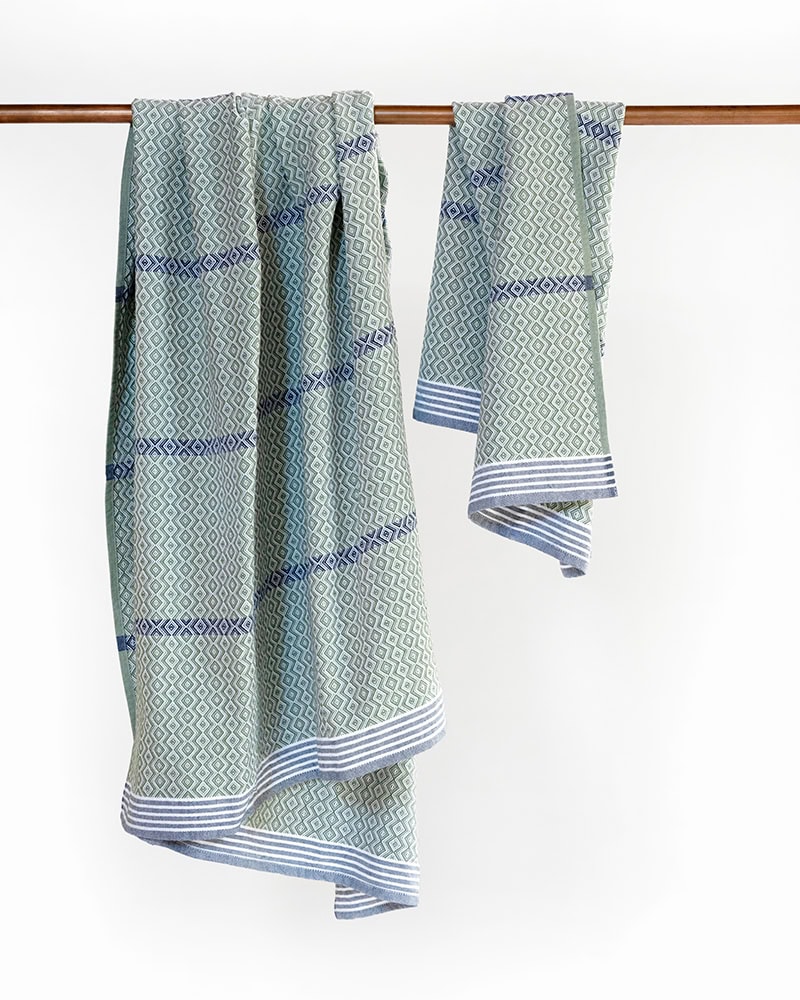 Hanging Itawuli towel and hand towel in Pine Green