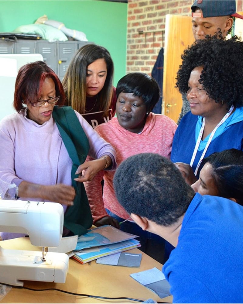 Mungo staff at the MOVE sewing workshop