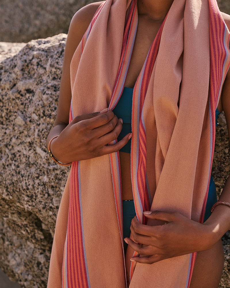 Model with the Apricot Kikoi wrapped around her shoulders