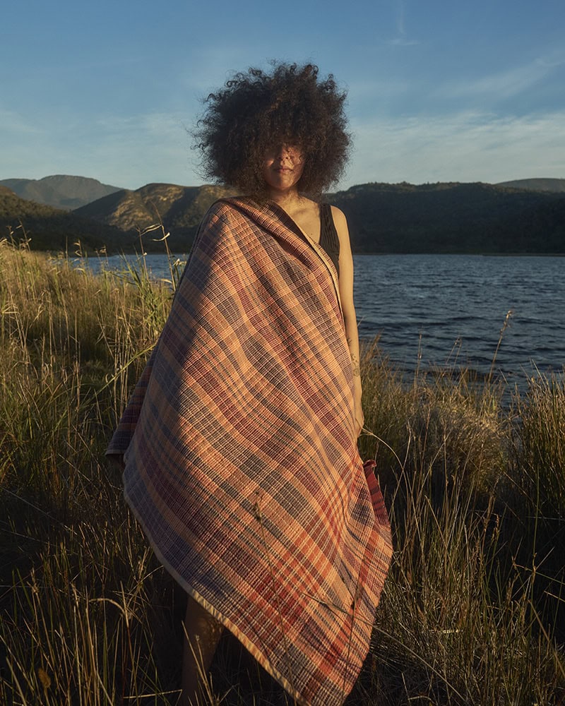 Model wearing the Volcano Wayfarer wrapped around her